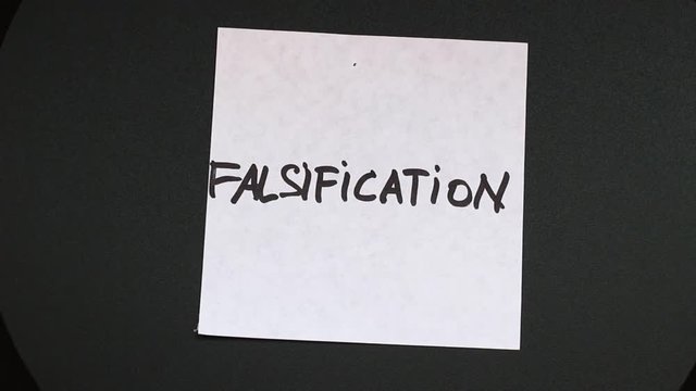 An inscription falsification on a sticker that is spinning