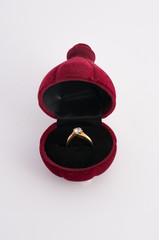 gold ring with box isolated on white background