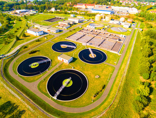Aerial view to sewage treatment plant. Grey water recycling. Waste management in European Union.