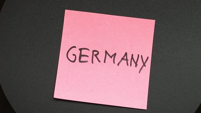 An inscription germany on a sticker that is spinning