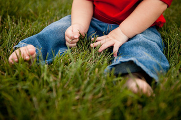 Baby Boy Sitting in Grass Outside - Color Portrait