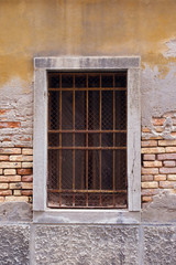 Fototapeta na wymiar Old vintage gated window