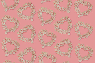 buttons on pink heart letter background