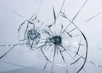Cracked glass on a white background texture