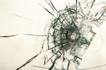 Cracked glass on a white background texture