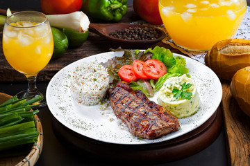 Grilled meat with trimmings