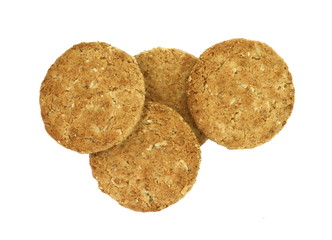 Round whole wheat biscuit, cookie with raisins isolated on white background. Biscuits with whole-wheat (wholemeal) flour isolated on white background 