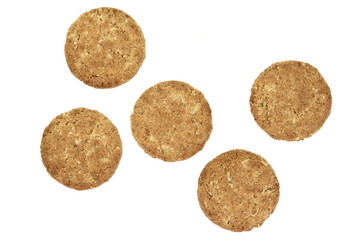 Round whole wheat biscuit, cookie with raisins isolated on white background. Biscuits with whole-wheat (wholemeal) flour isolated on white background 