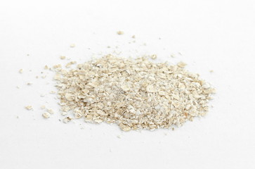 Pile of Dry oatmeal isolated on white background.