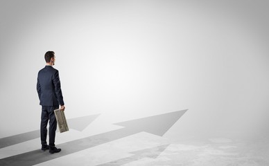 Obraz premium Man with object in his hand on the direct way to success