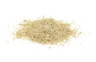 Wheat germ, the highly nutritious heart of the wheat kernel isolated on white. Wheat germ pile isolated on white background.