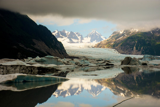 Sheridan Glacier Icy Reflection and Clouds in Alaska