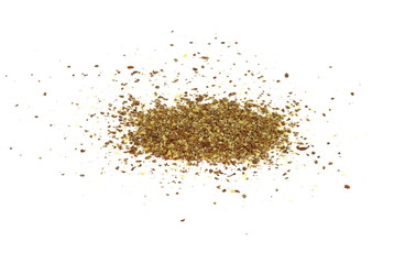 Ground or crushed brown flax seed or linseed isolated on white.