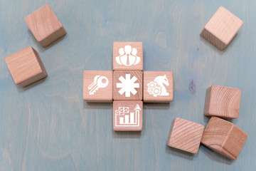 Asterisk business education сoncept on awooden blocks background.