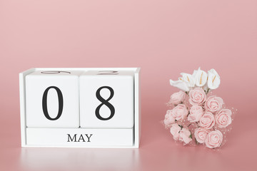 May 08th. Day 8 of month. Calendar cube on modern pink background, concept of bussines and an importent event.