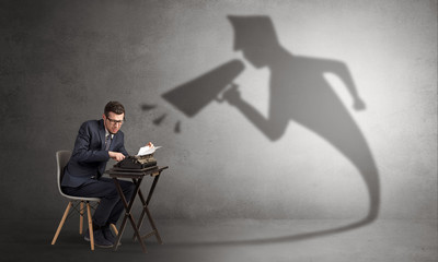 Hard working businessman shadow yelling to himself concept
