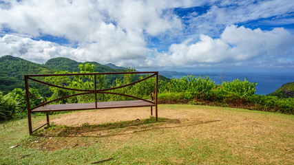 Fototapeta na wymiar Bench on viewing platform at venn's town, mahé, seychelles 2