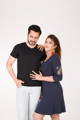 Fototapeta premium young couple together posing on white background