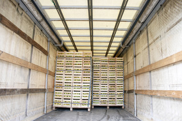Storage space in a truck full of apples