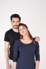 Fototapeta premium young couple together posing on white background