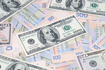 Money, dollars and hryvnia, close-up, top view. The concept of the dollar and the hryvnia, finance, banks.