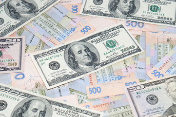 Money, dollars and hryvnia, close-up, top view. The concept of the dollar and the hryvnia, finance, banks.