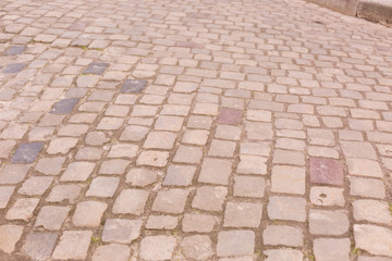 paving. the old road is made of stone. background texture stone walls