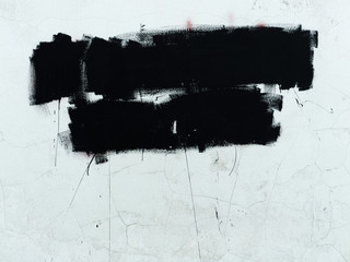White stone wall with black stain. top arrangement. background, texture