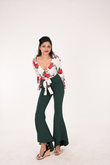 Pretty young female posing on white background