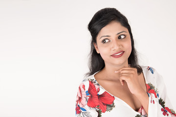 Pretty young female posing on white background