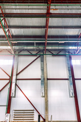 Ventilation systems inside the warehouse. Vertical.