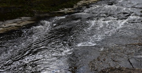 Low running river in yorkshire England
