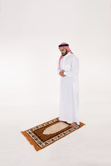 Muslim man praying on white Background