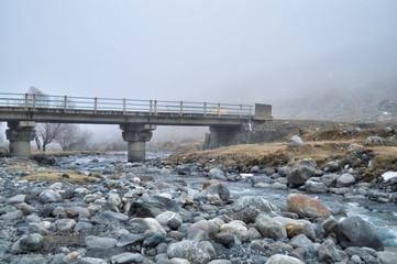 old bridge on the mountain river