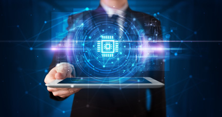 Hand holding tablet with online security and data protection concept
