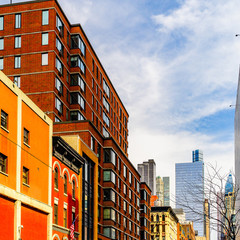 A brownstone corner apartment building in Manhattan, New York City.