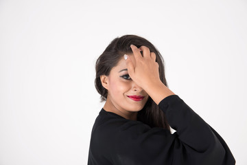 Arab woman in traditional dress on white background