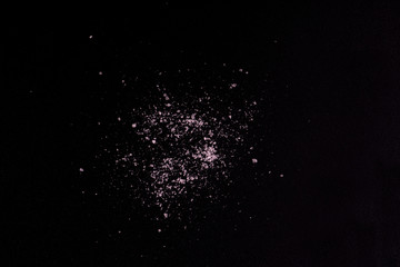 salt close up. salt on a black background.