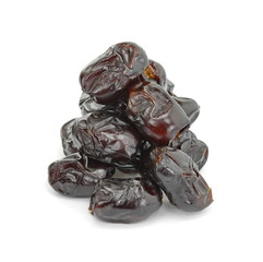 Dried dates over white background. Heap of dried dates isolated on white background.