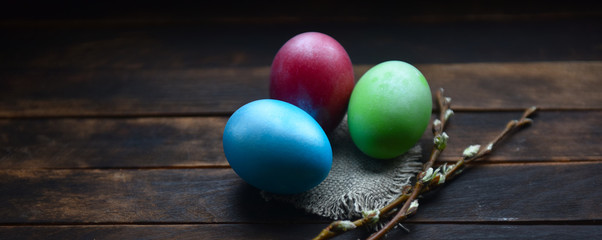 Obraz premium painted Easter eggs on wooden background