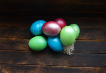 Fototapeta na wymiar painted Easter eggs on wooden background