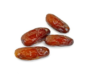 Dried dates over white background. Heap of dried dates isolated on white background.