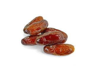 Dried dates over white background. Heap of dried dates isolated on white background.