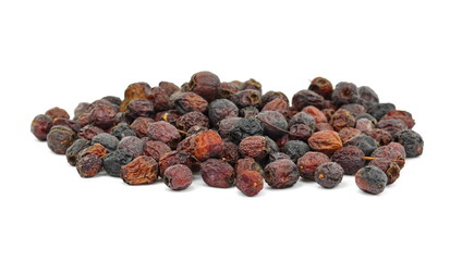 Dried medicinal herbs raw materials isolated on white. Fruit of Crataegus commonly called hawthorn, thornapple, May-tree, whitethorn, or hawberry. Cure for the heart. medicine in a cup of tea.