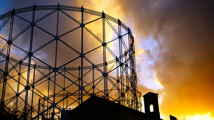 View of the gasometer at sunset with cloudy sky, a structure designed in the nineteenth century for...