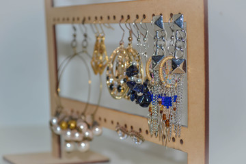 earrings hanging on display