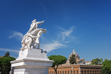 Fototapeta na wymiar The Vittorio Emanuele II Monument also known as the Vittoriano, or Altare della Patria, built between the Piazza Venezia (The Venice Square) and the Capitoline Hill- the central hub of Rome .