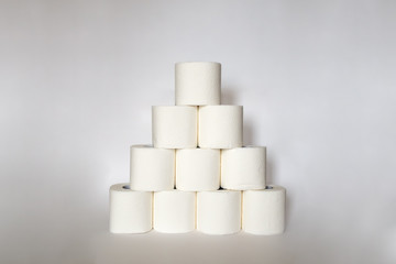 rhythmic pyramid of toilet paper rolls