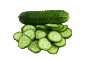 Fresh green cucumbers on a white background. One whole cucumber and several slices isolated on white background.