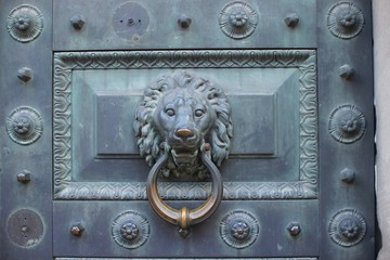 Bronze knocker in the shape of a lion head from Stieglitz Academy, Saint Petersburg. Russia